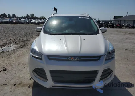 2014 Ford Escape Titanium z USA, uszkodzony, nr VIN 1FMCU0J93EUA74068